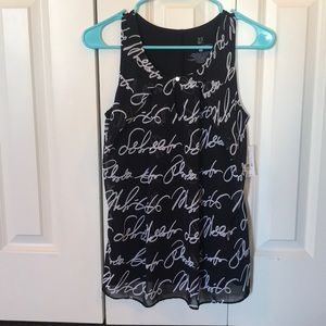 NWT. XS Sleeveless Top. Black and white
